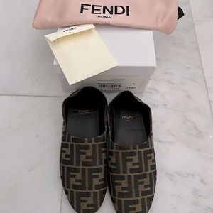 FENDI
Leather Trimmed Canvas Collapsible Heel Slippers